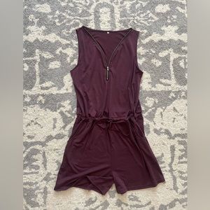 Purple romper.
